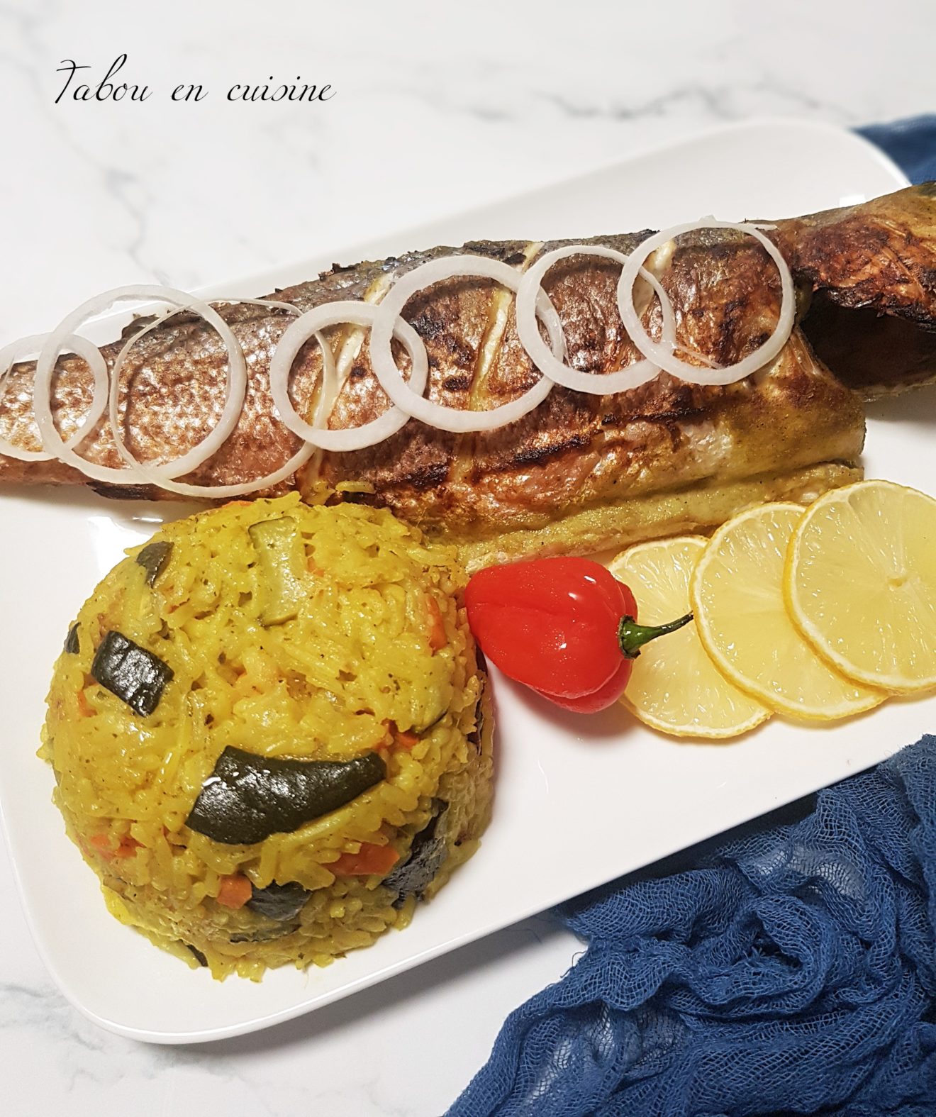 Poisson braisé et riz aux légumes.